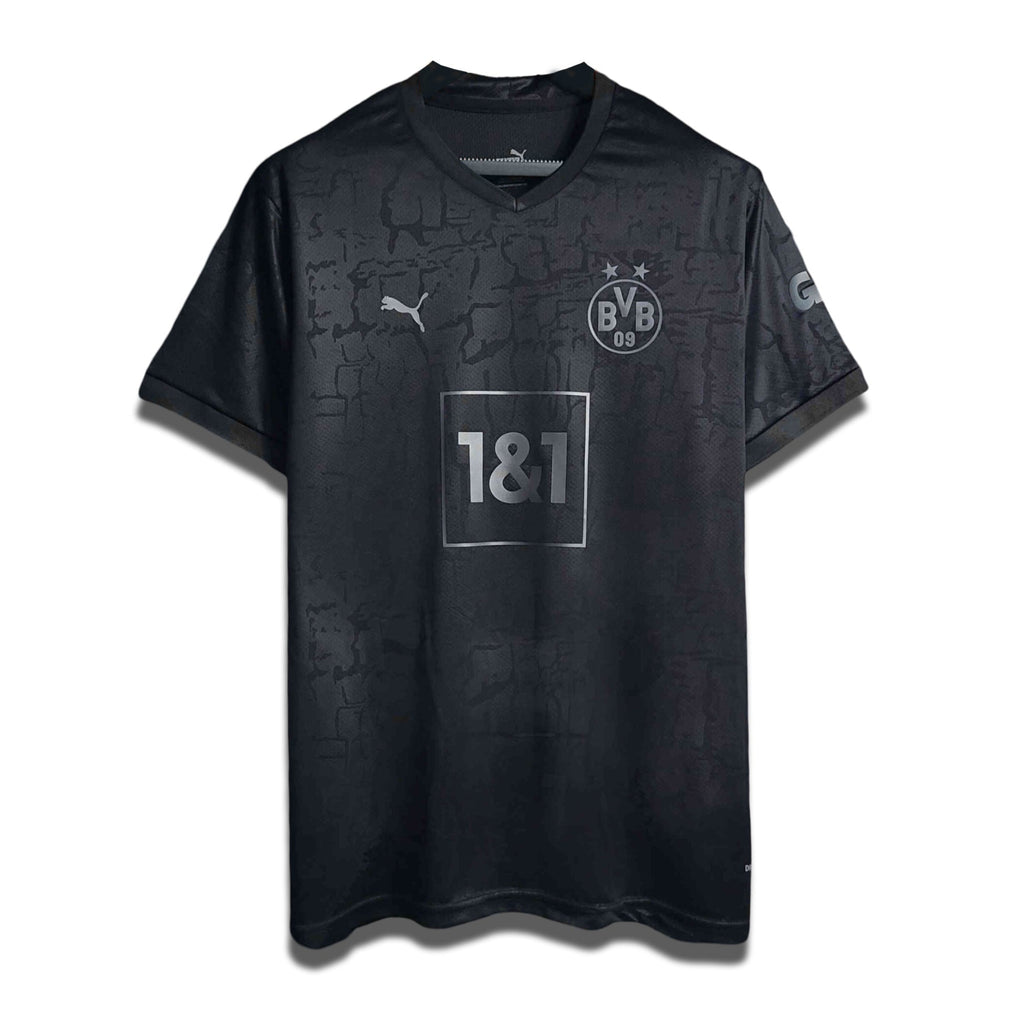 Limited edition black home shirt from Borussia Dortmund's 2023/24 Season with camouflage pattern and sponsor logo.