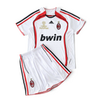 Elite Retro Kits AC Milan 2006/07 away kids kit in white with red and black accents and Champions League final detail.