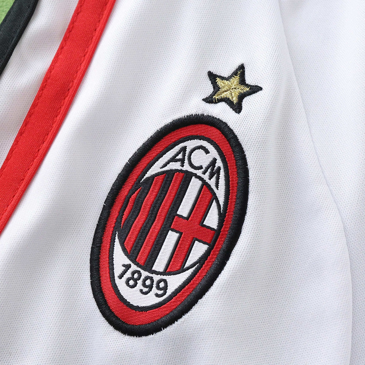 Elite Retro Kits AC Milan 2006/07 away kids kit featuring the embroidered club crest and gold star on white fabric.