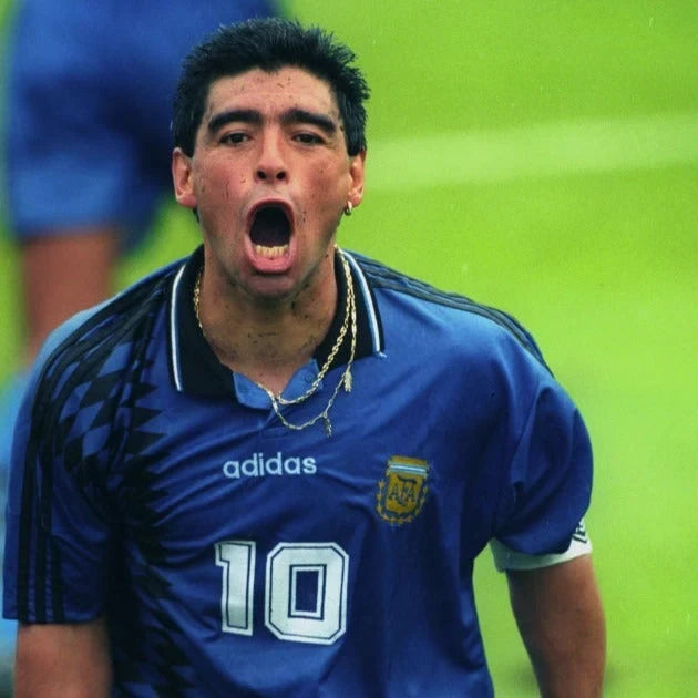 Elite Retro Kits Argentina 1994 away kids kit featuring a blue shirt with black diamond patterns and AFA crest