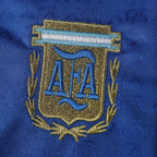 Elite Retro Kits Argentina 1994 away shirt featuring a detailed embroidered AFA crest on deep blue fabric