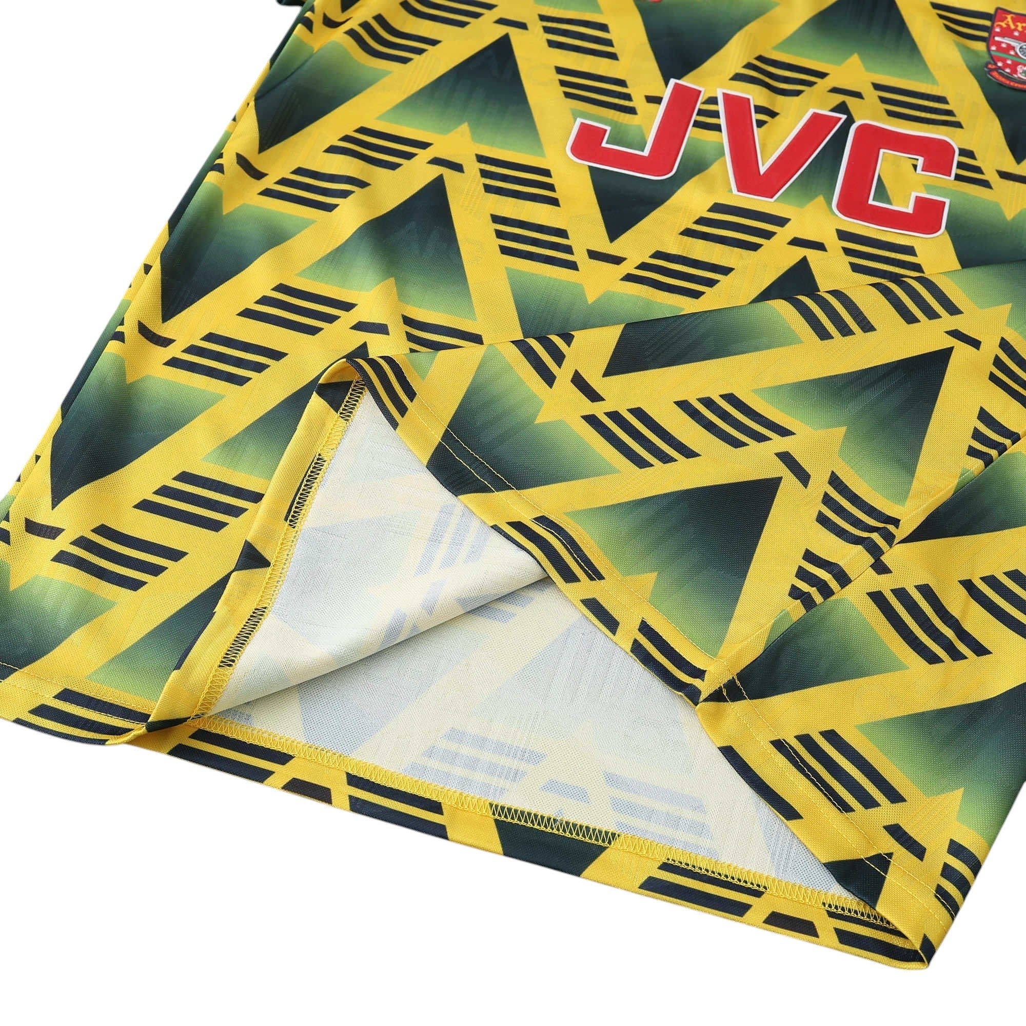 Elite Retro Kits Arsenal 1991-93 Bruised Banana away shirt featuring a yellow base with jagged navy geometric patterns.