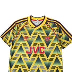 Elite Retro Kits Arsenal 1991-93 Bruised Banana away shirt featuring yellow base, navy jagged pattern, and JVC logo.