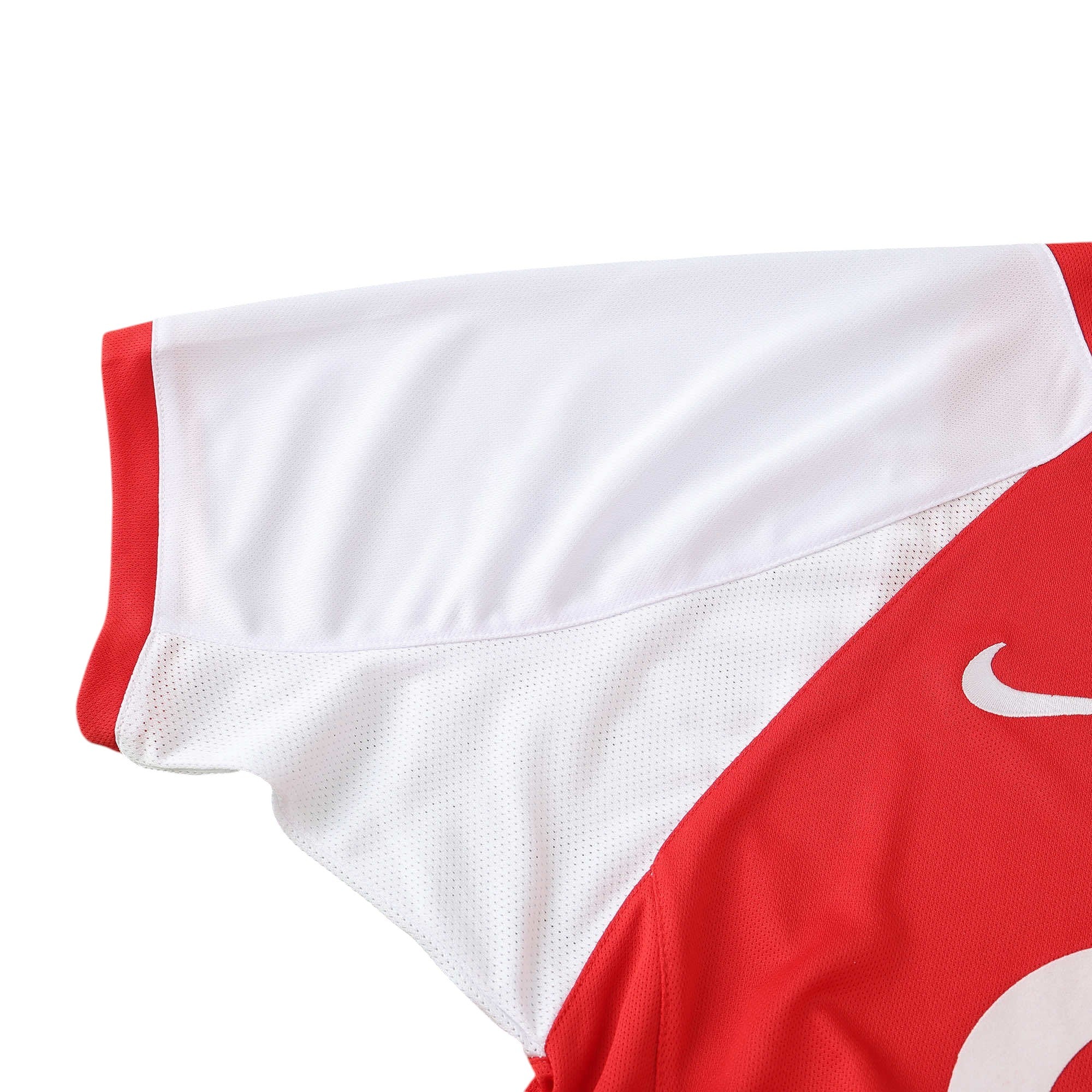 Elite Retro Kits Arsenal 2002-04 home shirt featuring iconic red body and white sleeves with Nike logo detail