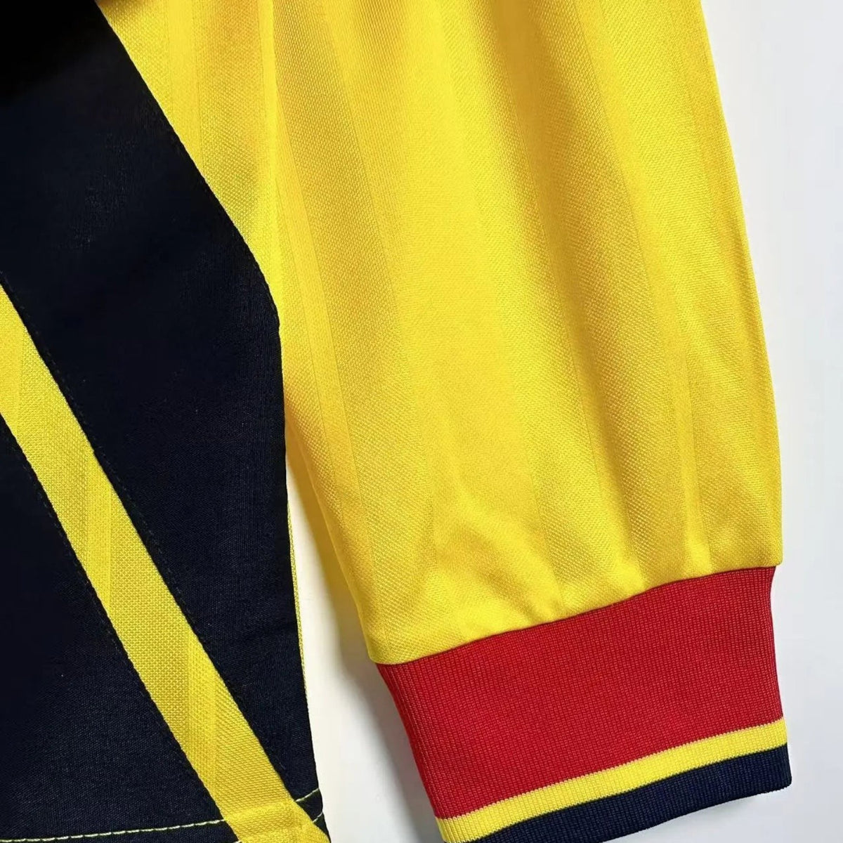 Elite Retro Kits Arsenal 1993/94 long sleeve away shirt in yellow and navy with red and yellow striped cuffs