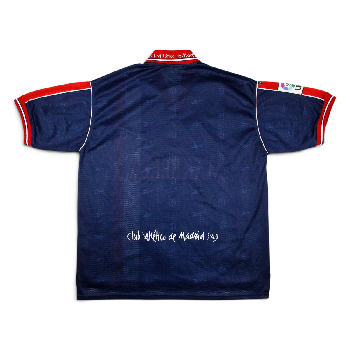 Elite Retro Kits Atletico Madrid 1998/99 away jersey in dark blue with red and white collar and sleeve trim.