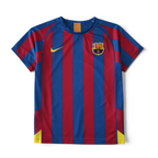 Elite Retro Kits Barcelona 2005/06 home kids jersey with iconic blue and maroon stripes and yellow Nike logo.