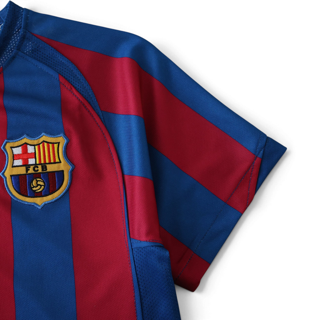 Elite Retro Kits Barcelona 2005/06 kids home jersey featuring iconic blue and maroon stripes and embroidered FCB crest