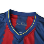 Elite Retro Kits Barcelona 2009/10 home shirt featuring blue and maroon stripes with a yellow-trimmed V-neck collar.