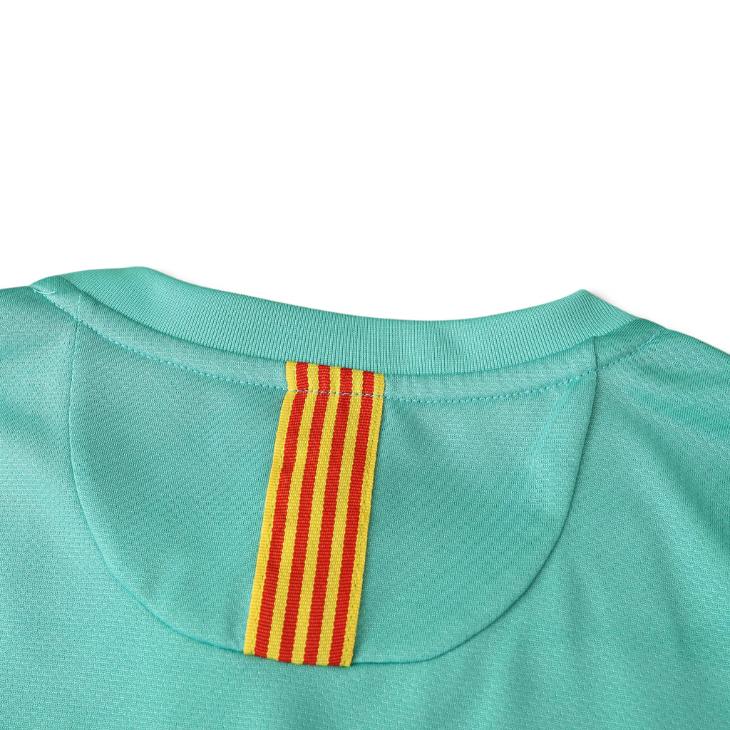 Elite Retro Kits Barcelona 2010/11 away shirt featuring a turquoise fabric and a yellow and red Senyera neck detail.