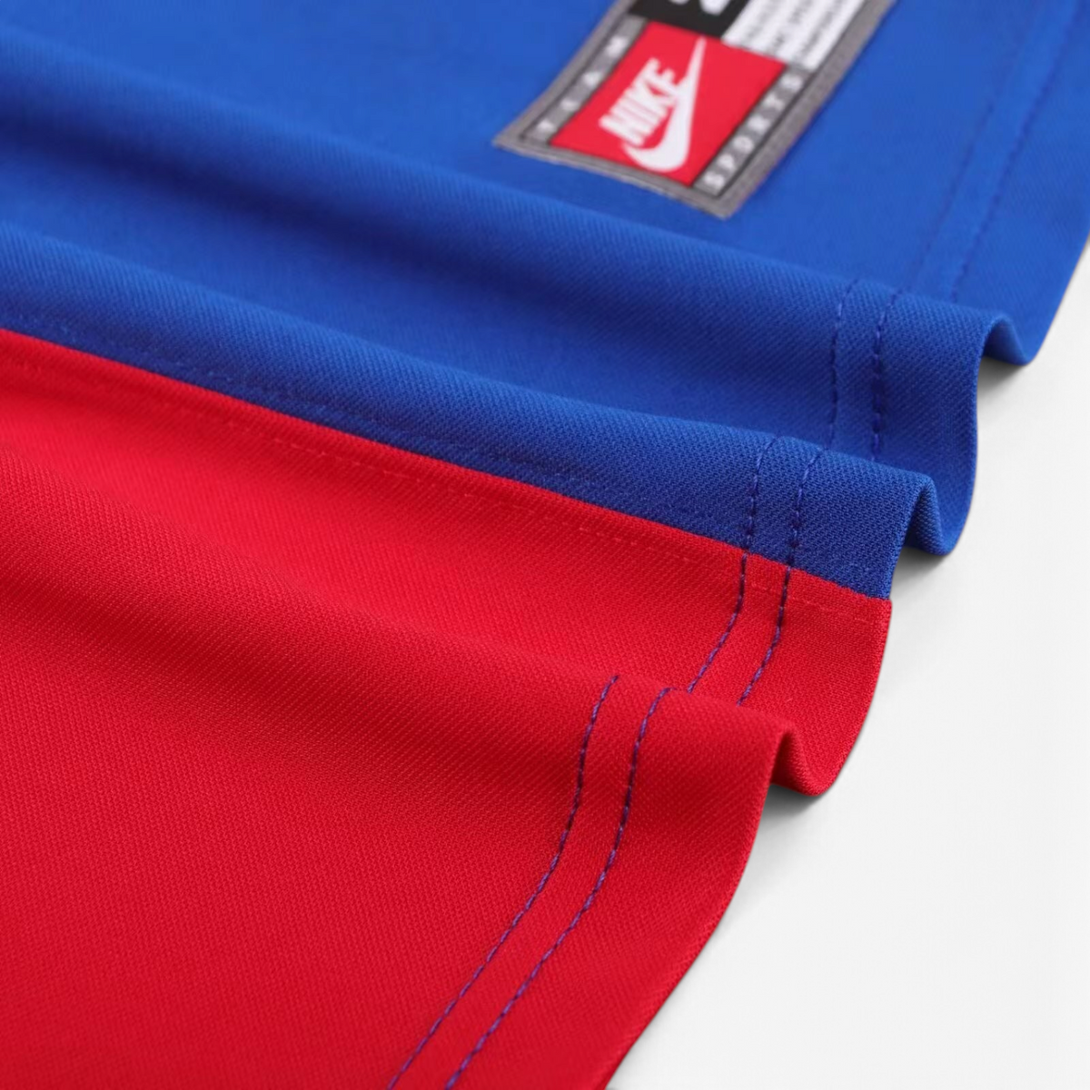 Elite Retro Kits Barcelona 1999 centenary kids football kit featuring blue and maroon half-and-half fabric detail