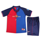 Elite Retro Kits Barcelona 1999/00 centenary kids home kit featuring a blue and maroon half-and-half shirt and shorts.