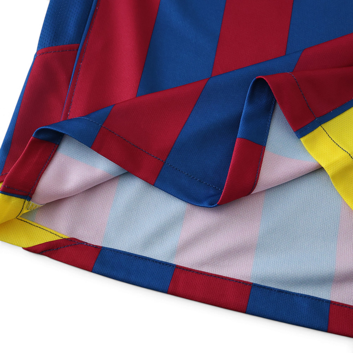 Elite Retro Kits Barcelona 2005/06 kids home kit featuring iconic blue and maroon vertical stripes on soft fabric.