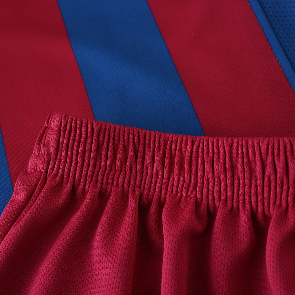 Elite Retro Kits kids Barcelona 2005/06 home kit featuring blue and maroon striped jersey and matching maroon shorts