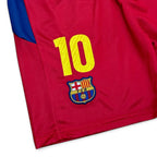 Elite Retro Kits Barcelona 2010/11 kids home shorts in red with blue trim, featuring number 10 and FCB club crest.
