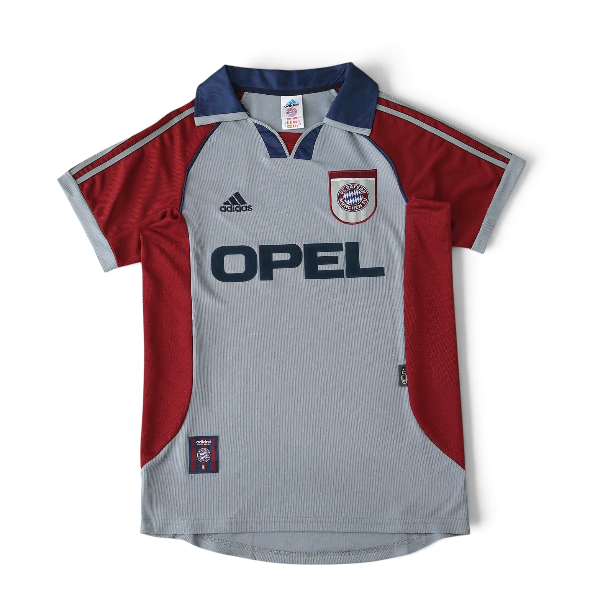 Elite Retro Kits Bayern Munich 1998/99 away football shirt in grey with red sleeves and navy collar details.