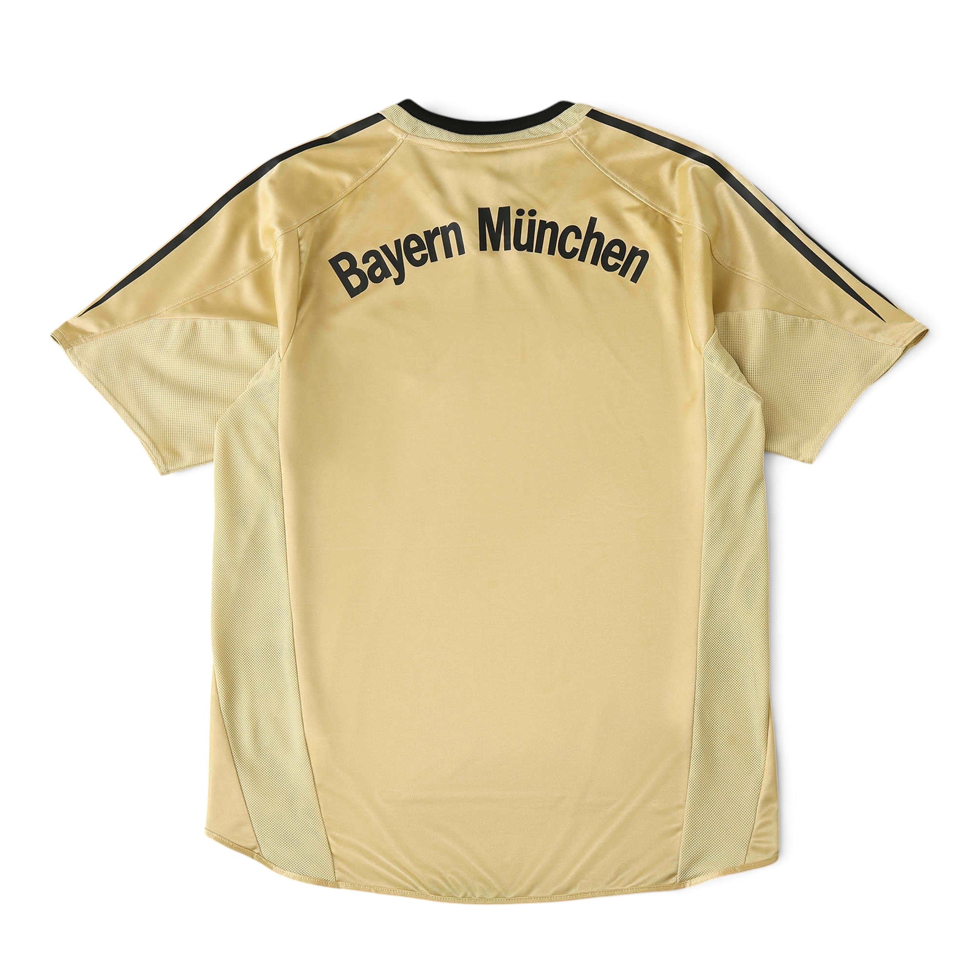 Back view of Elite Retro Kits Bayern Munich 2004/05 away football shirt in gold with black lettering and trim.