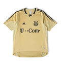 Elite Retro Kits Bayern Munich 2004/05 away football shirt in gold with deep red accents and classic T-Com sponsor.