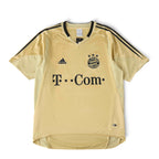 Elite Retro Kits Bayern Munich 2004/05 away football shirt in gold with deep red accents and classic T-Com sponsor.