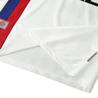 Elite Retro Kits Bayern Munich 1997/98 away shirt featuring white fabric with subtle pattern and red and blue trim.