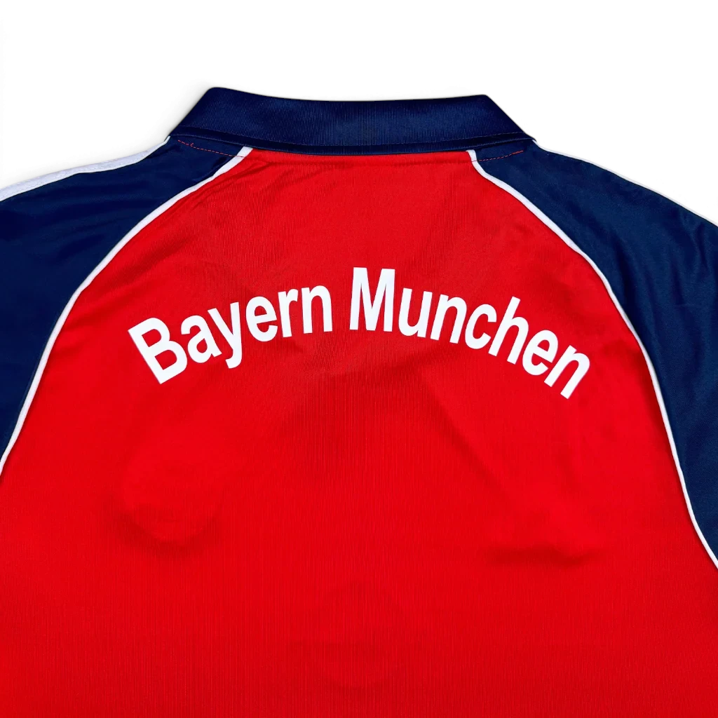 Elite Retro Kits Bayern Munich 1999-01 home shirt in deep red with navy collar and white Bayern Munchen back lettering