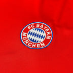 Elite Retro Kits Bayern Munich 1999-01 home shirt featuring a detailed embroidered FC Bayern crest on deep red fabric