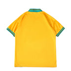 Back view of Elite Retro Kits Bayern Munich 1993/95 away football shirt in yellow with green and blue collar trim.