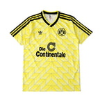 Elite Retro Kits Borussia Dortmund 1988/89 home shirt in yellow and black with geometric pattern and sponsor logo.