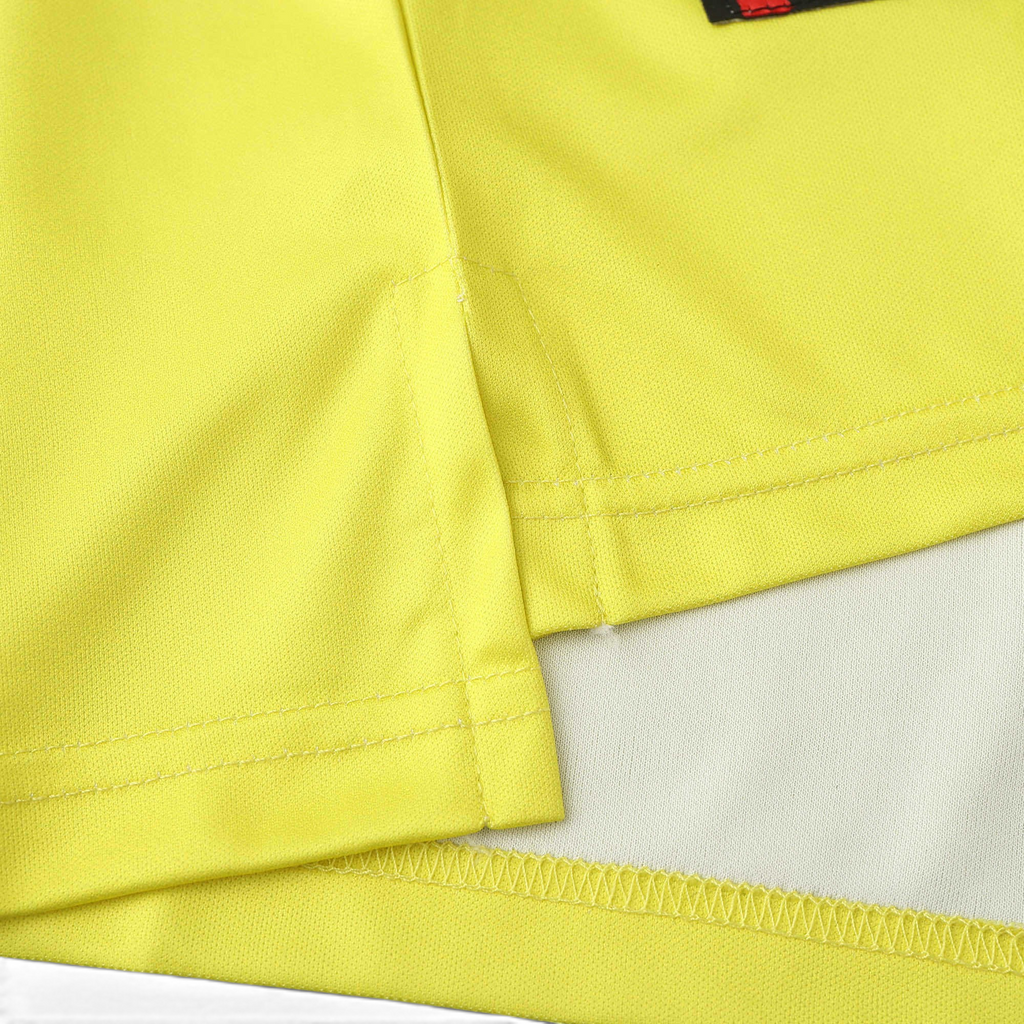 Elite Retro Kits Borussia Dortmund 1995/96 home shirt hem detail showing vibrant yellow fabric and stitched side vent