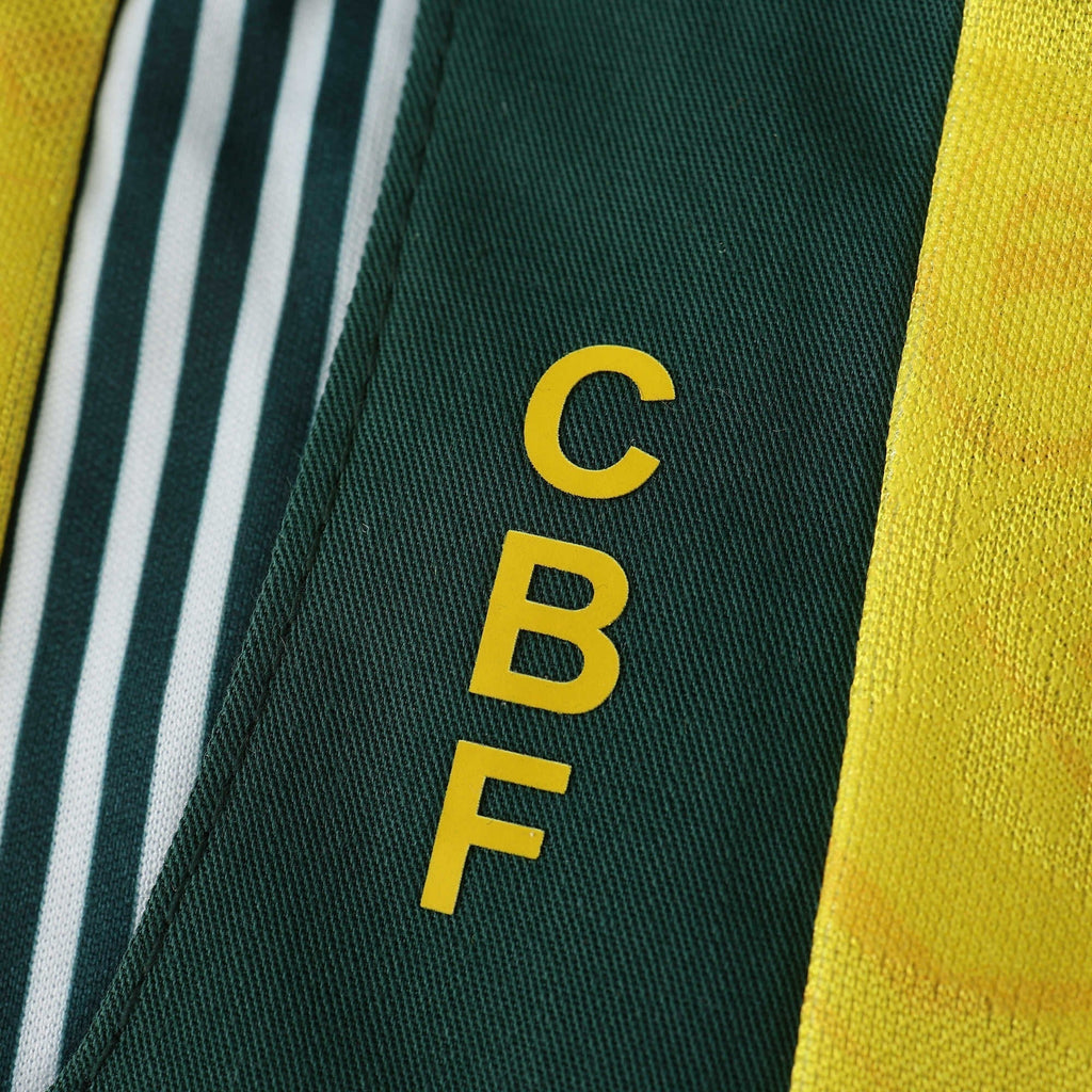 Elite Retro Kits Brazil 1992 home shirt detail showing the green collar with yellow CBF lettering and fabric pattern.