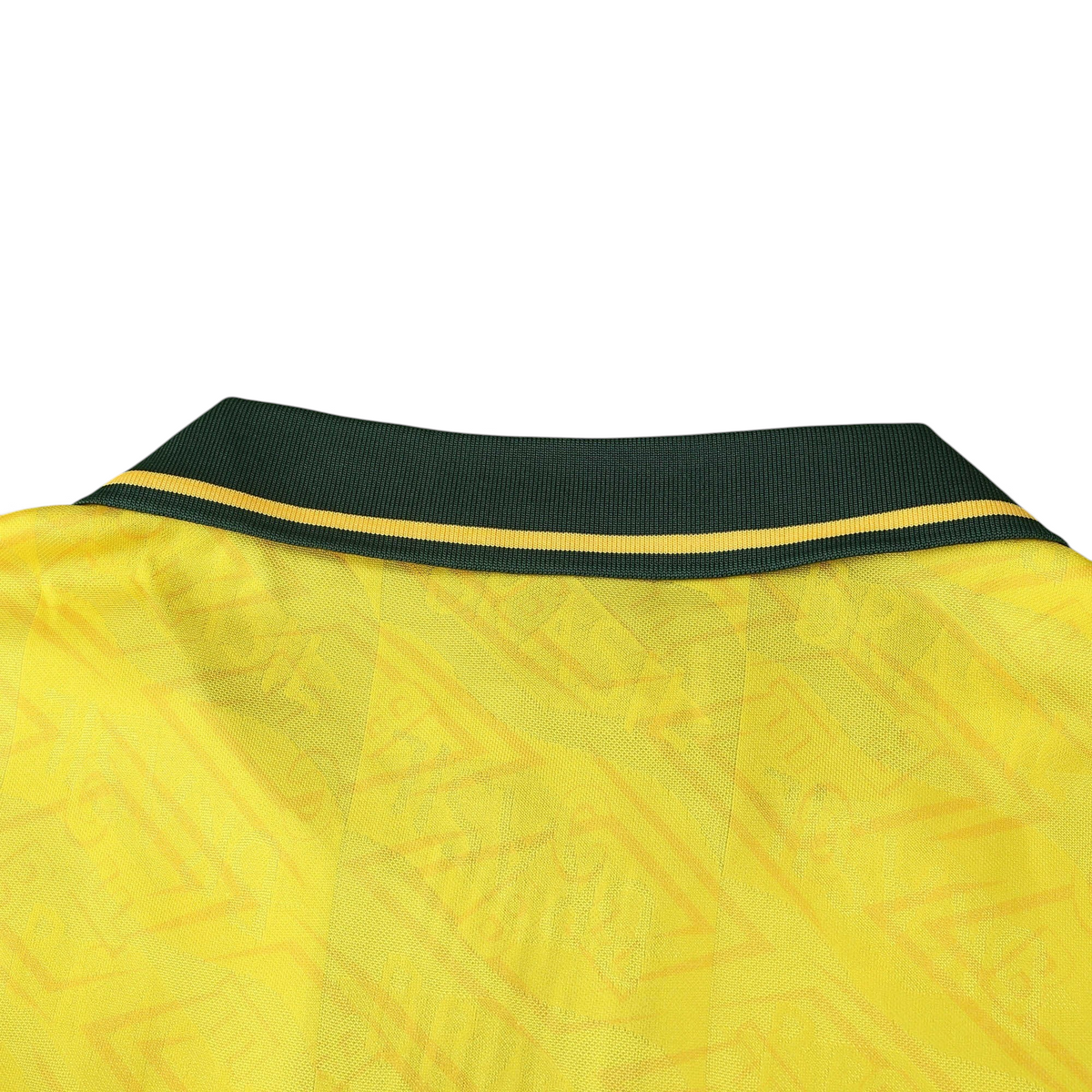 Elite Retro Kits Brazil 1992 home shirt featuring a yellow fabric with a subtle pattern and a dark green buttoned collar