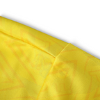 Elite Retro Kits Brazil 1992 home shirt in yellow with a subtle geometric fabric pattern and green collar detail