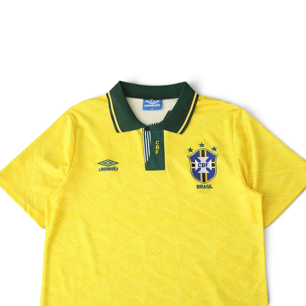 Elite Retro Kits Brazil 1992 home football shirt in yellow with a green buttoned collar and subtle fabric pattern