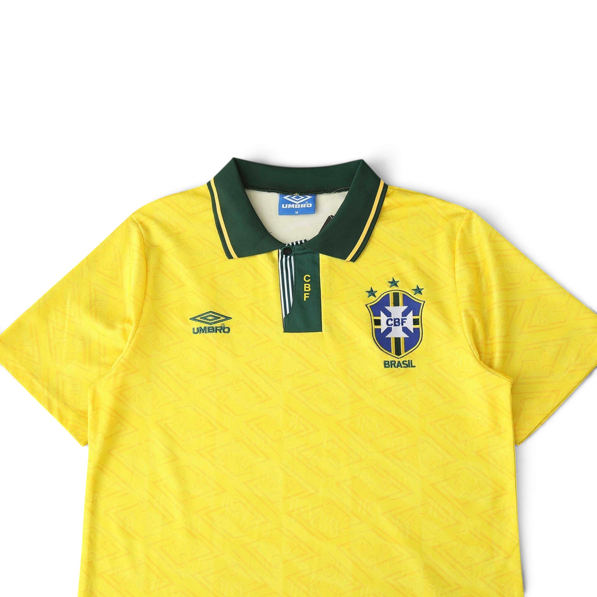 Elite Retro Kits Brazil 1992 home football shirt in yellow with a green buttoned collar and subtle fabric pattern