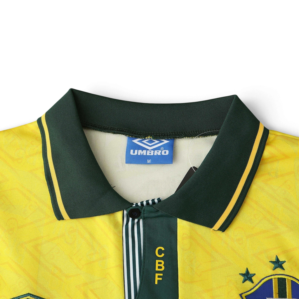 Elite Retro Kits Brazil 1992 home shirt in yellow with a dark green buttoned collar and subtle fabric pattern