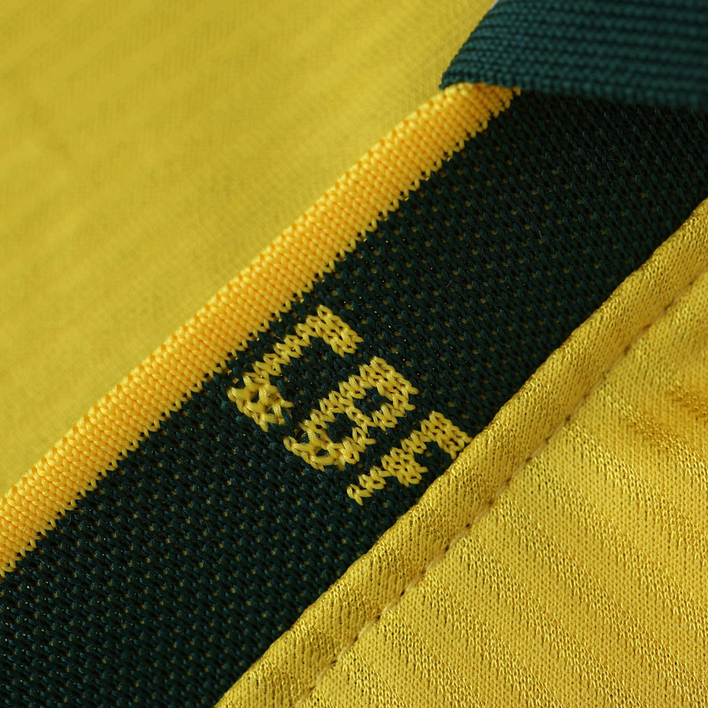 Elite Retro Kits Brazil 1994 home shirt featuring yellow fabric with a green trim and embroidered CBF crest detail