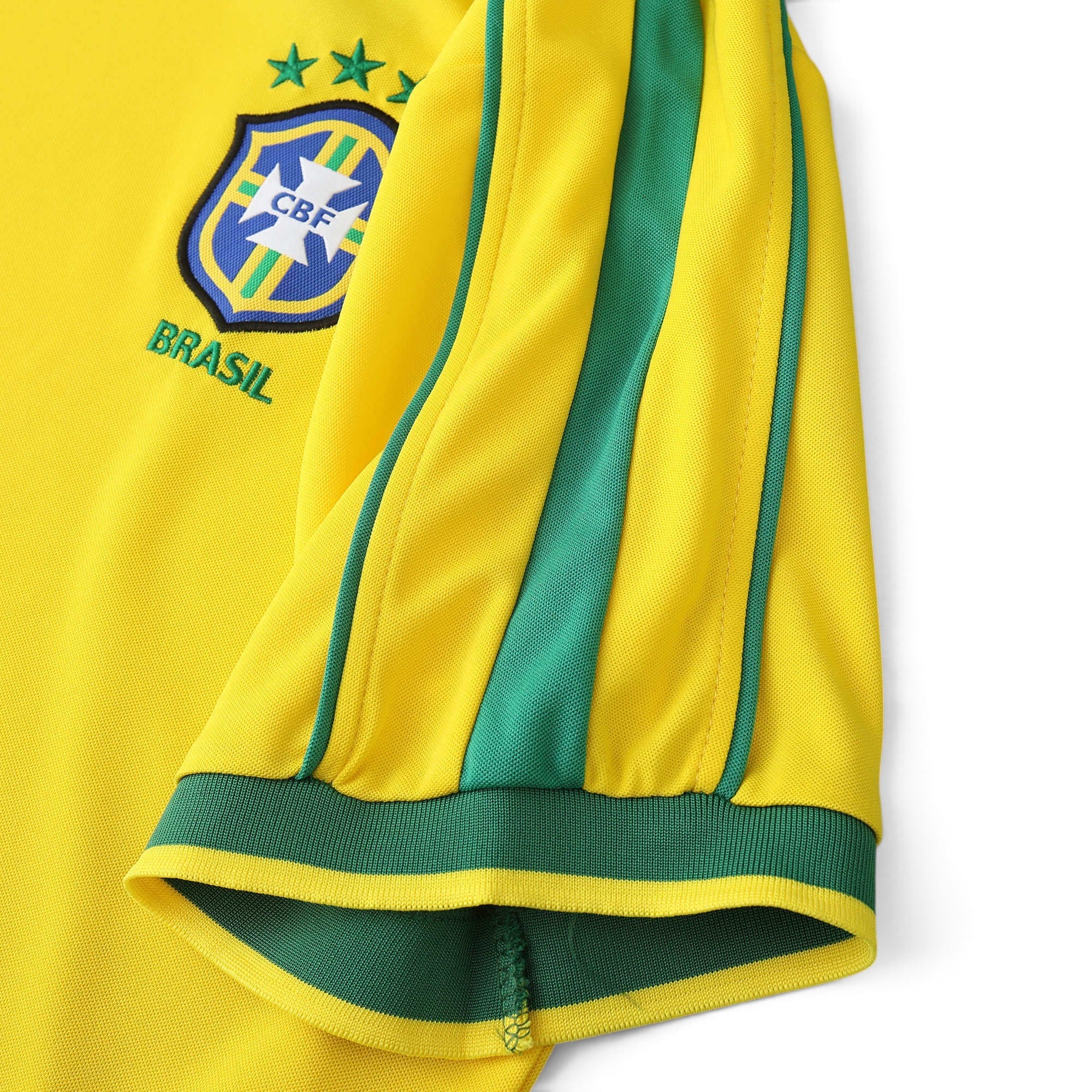 Elite Retro Kits Brazil 1998 World Cup home shirt featuring yellow fabric, green sleeve trim, and the CBF crest.