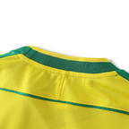 Elite Retro Kits Brazil 1998 kids home jersey featuring a yellow fabric with green collar and shoulder trim detail