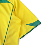 Elite Retro Kits Brazil 2004 home football shirt in yellow with green piping and breathable mesh fabric detail