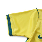 Elite Retro Kits Brazil 2026 World Cup kids home kit sleeve in yellow with green ribbed trim and embroidered logo