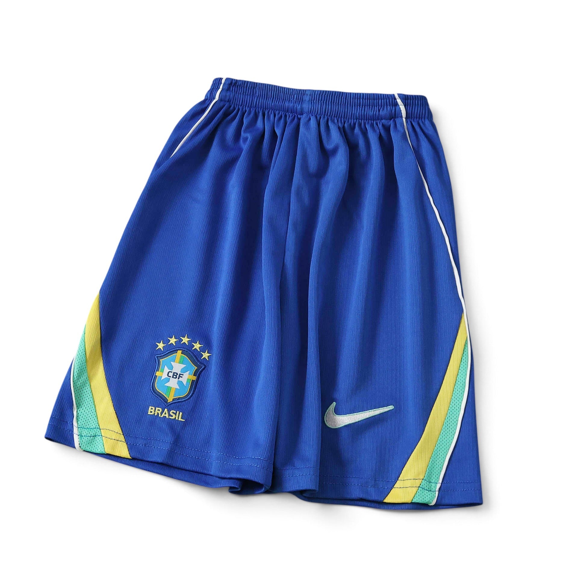 Elite Retro Kits Brazil 2026 kids football shorts in blue with green and yellow side accents and CBF team crest.