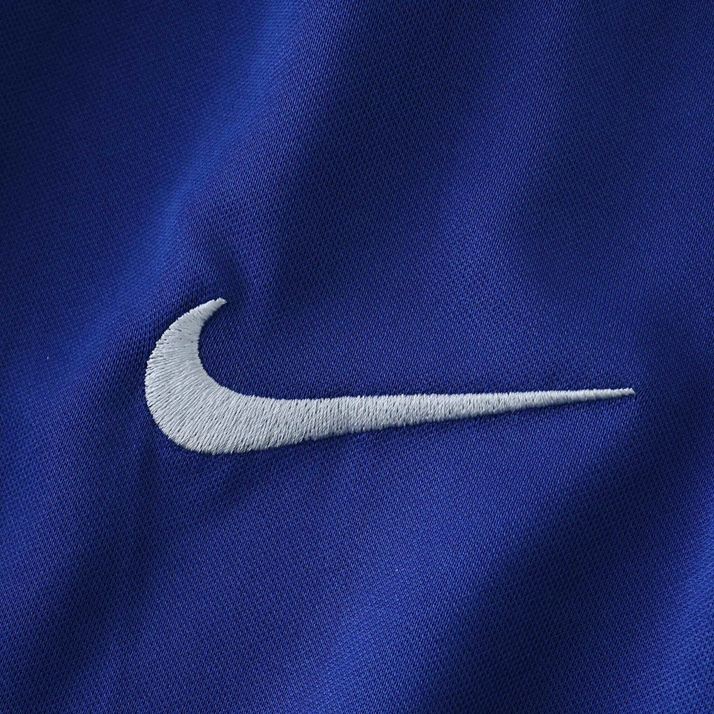 Elite Retro Kits Brazil 1998 kids kit featuring a white embroidered Nike swoosh logo on blue fabric
