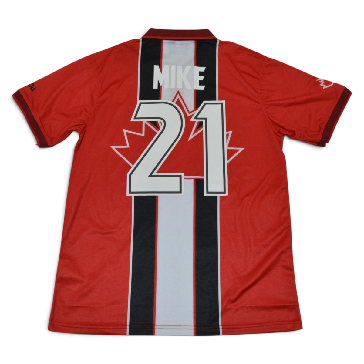 Back view of Elite Retro Kits Canada 1998 home football shirt in red with white and black central graphic and number 21