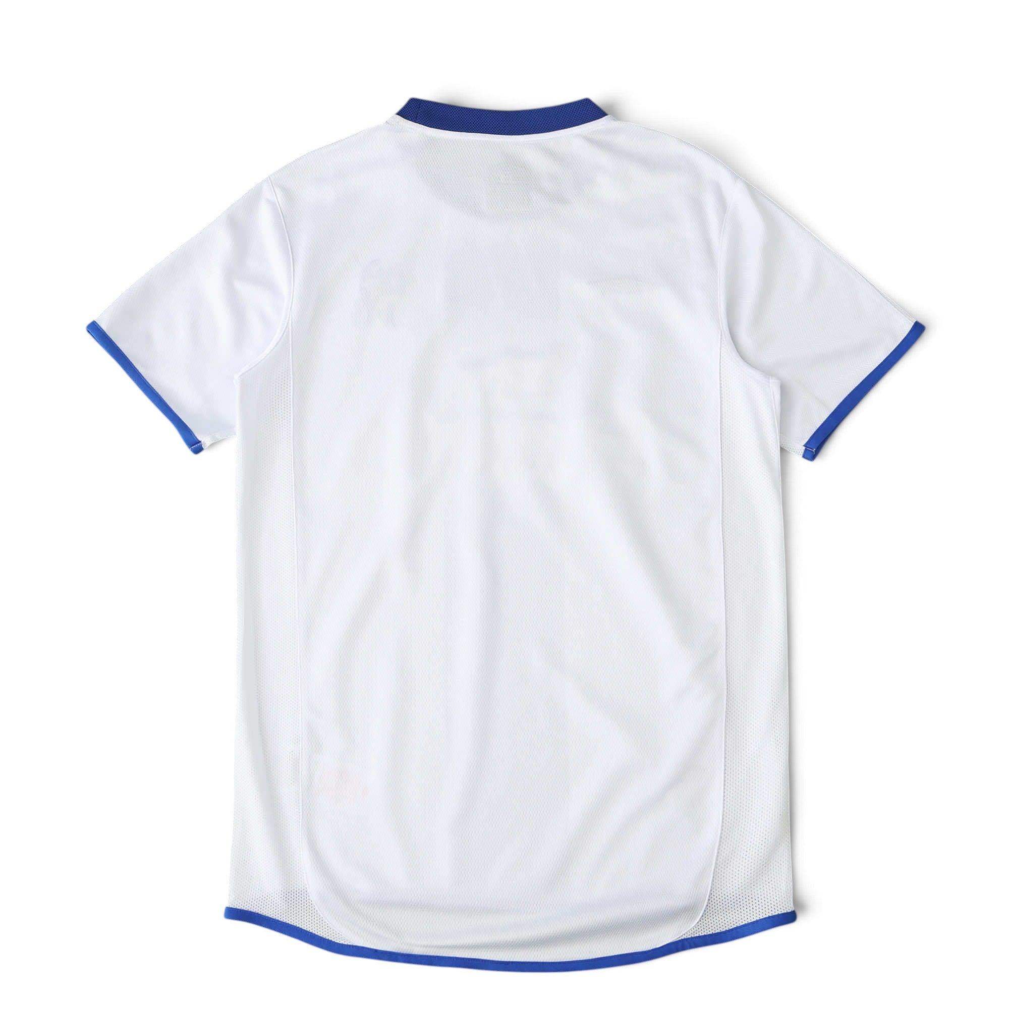 Elite Retro Kits Chelsea 2003/05 away football shirt, white with blue trim, back view on a green pitch background.