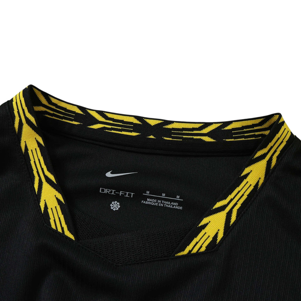 Elite Retro Kits Chelsea 2026/27 away shirt featuring a black base with yellow Midwest Gold collar detailing.