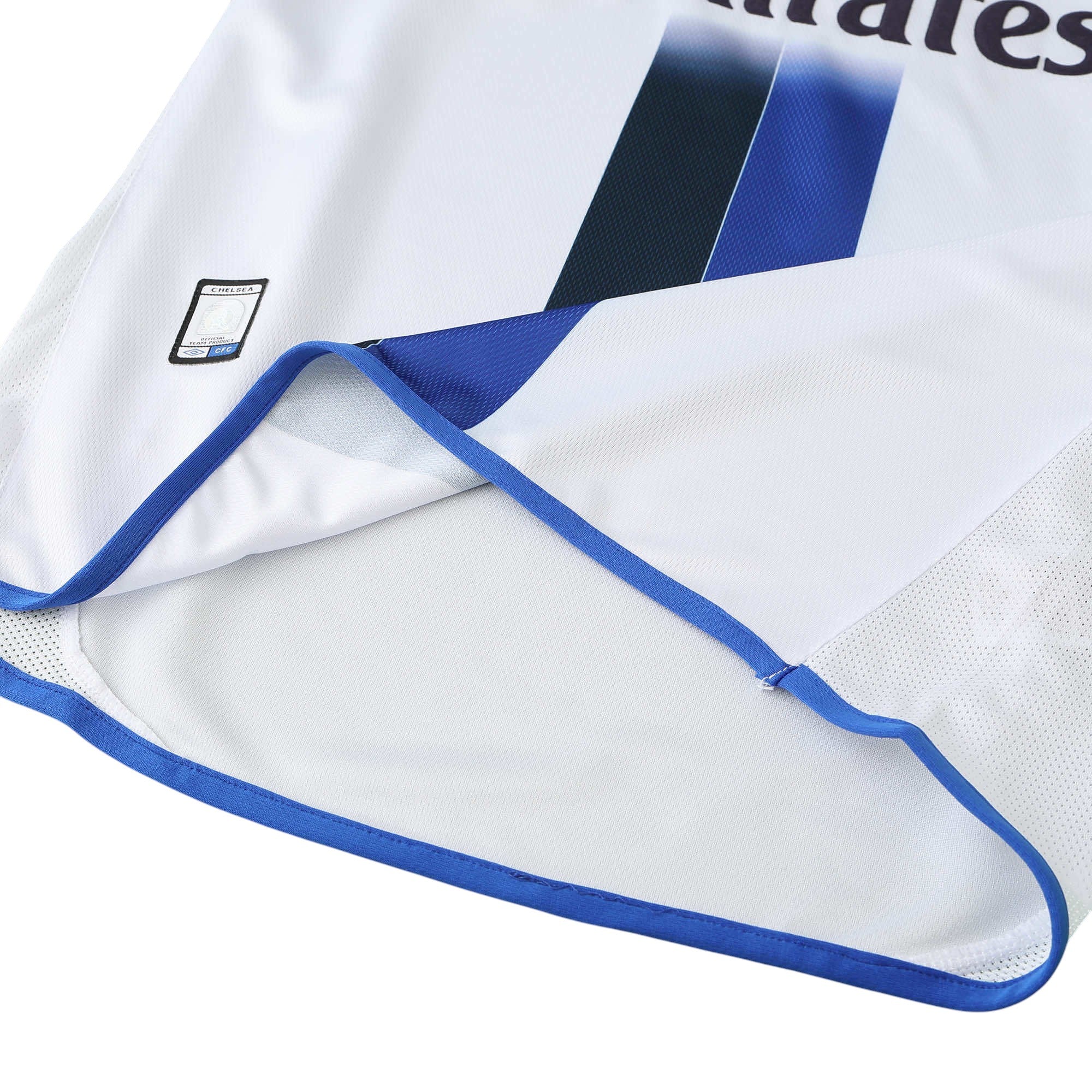 Elite Retro Kits Chelsea 2003/05 away shirt featuring white fabric, blue trim, and an authentic club hem patch.