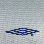 Elite Retro Kits Chelsea 2003/05 away shirt featuring a blue embroidered Umbro logo on a grey mesh fabric texture.