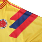 Elite Retro Kits Colombia 1990 home football shirt in bright yellow with red and blue shoulder stripe detailing