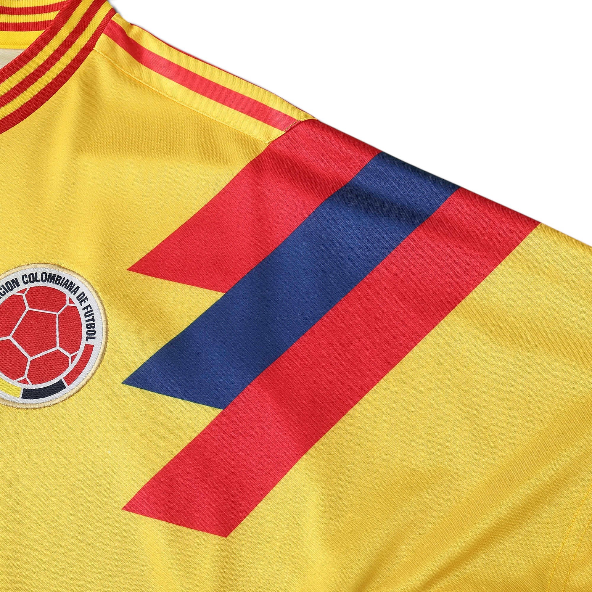 Elite Retro Kits Colombia 1990 home football shirt in bright yellow with red and blue shoulder stripe detailing