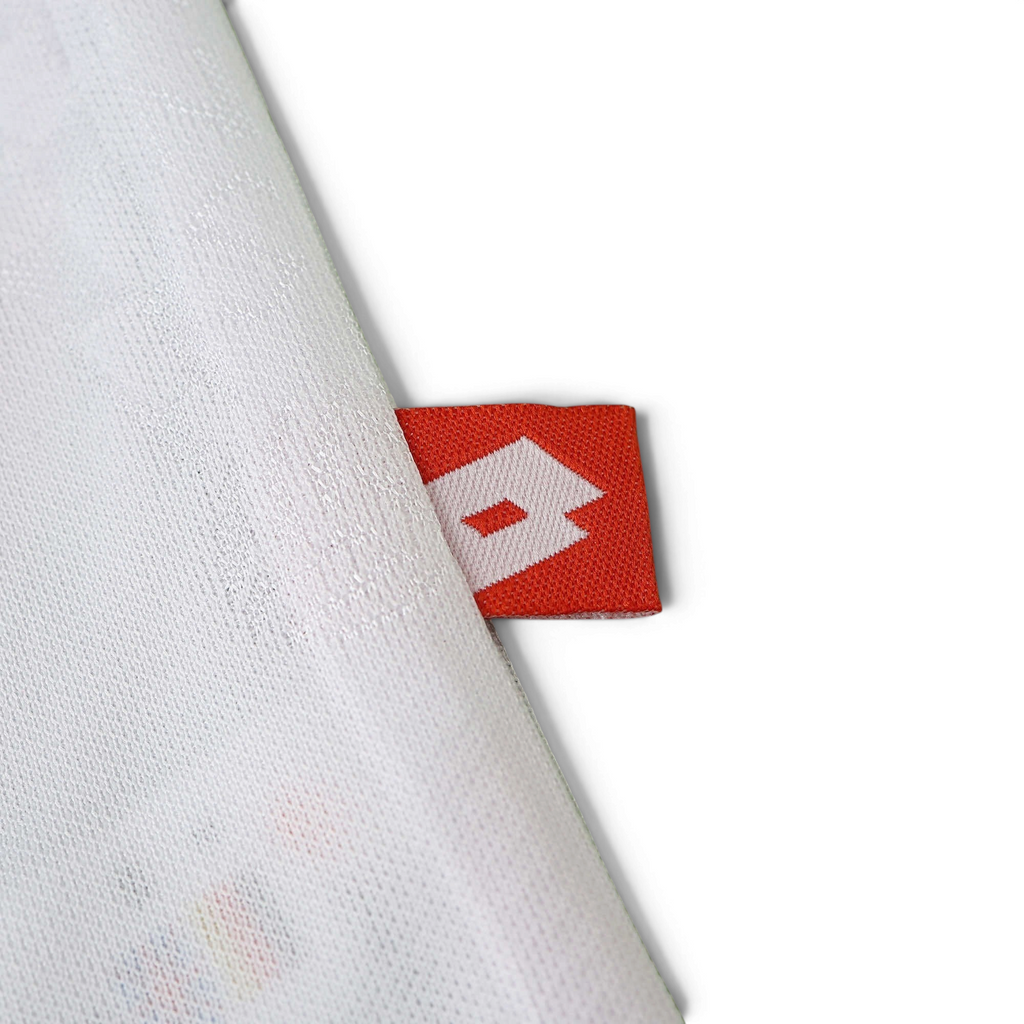 Elite Retro Kits Croatia 1998 home shirt detail showing the red and white Lotto brand tag on the white fabric